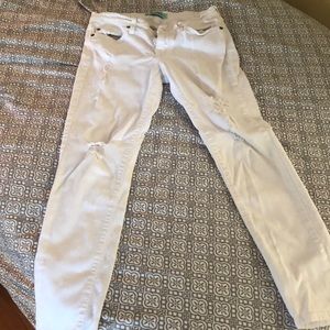 Karlie cropped and ripped white jeans.